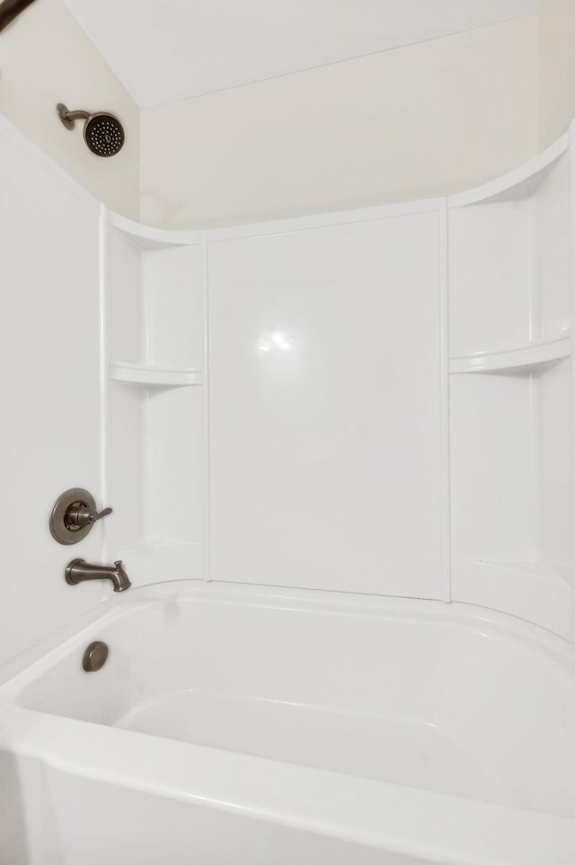 bathroom with shower / tub combination