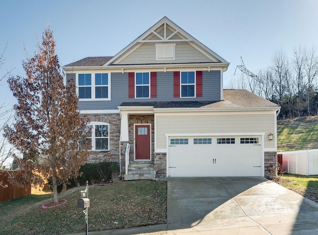 craftsman house with a garage