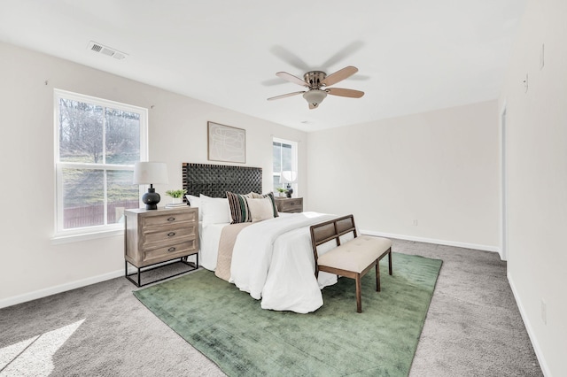 carpeted bedroom with ceiling fan