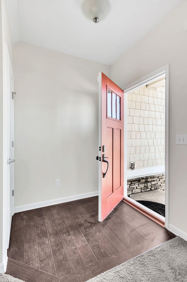 foyer entrance with vaulted ceiling