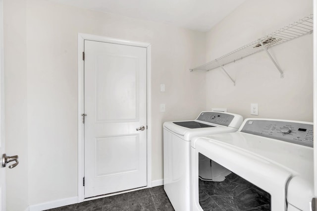 laundry room with washer and clothes dryer