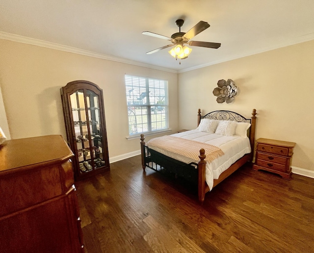 bedroom featuring ornamental molding, dark hardwood / wood-style floors, and ceiling fan