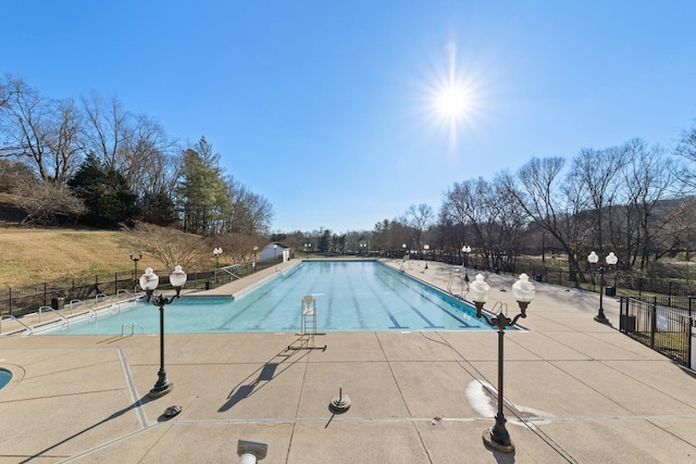 view of swimming pool featuring a patio