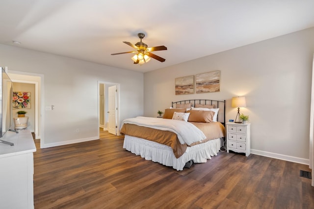 bedroom featuring dark hardwood / wood-style flooring and ceiling fan