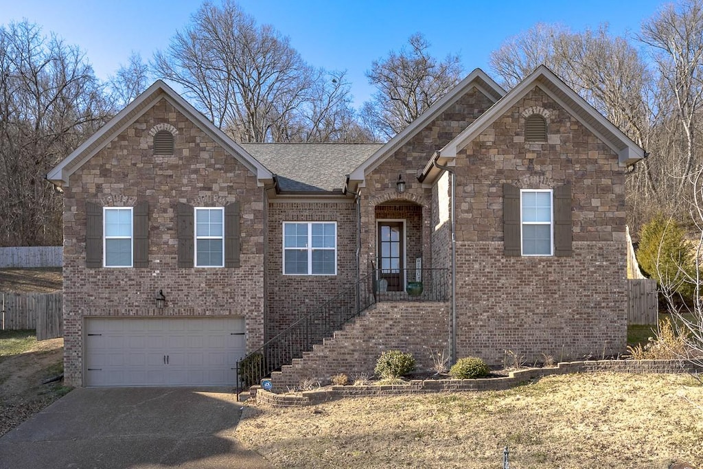 view of front of home with a garage