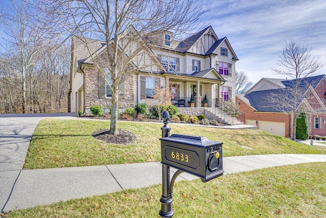 view of front of home featuring a porch and a front yard