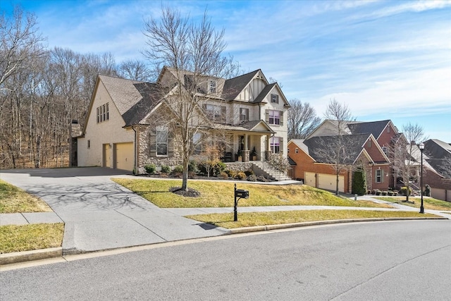 view of front of home with a garage and a front yard