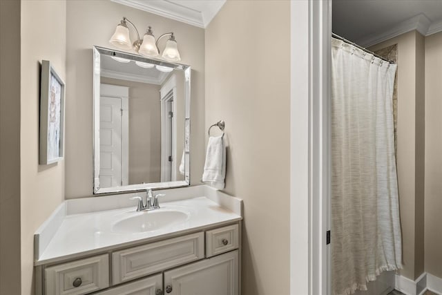 bathroom with vanity, crown molding, and curtained shower