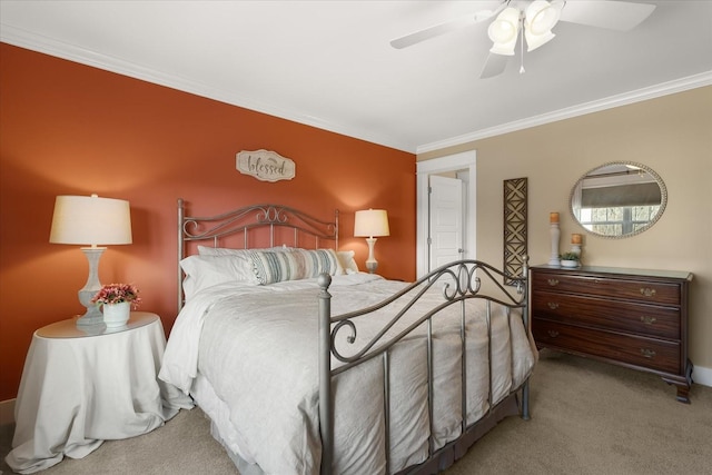 bedroom featuring ceiling fan, light colored carpet, and ornamental molding