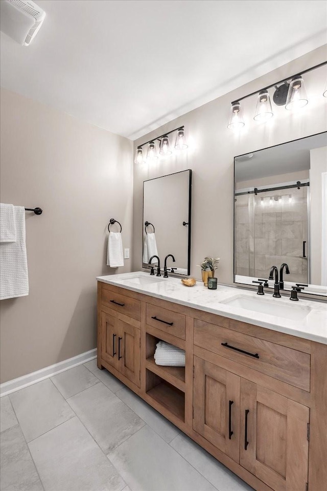 bathroom with vanity and walk in shower