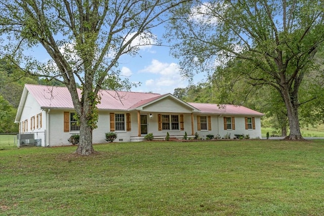 ranch-style house with central AC, covered porch, and a front lawn