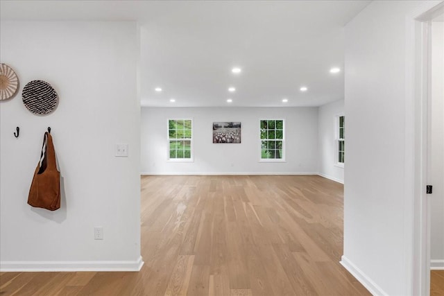 unfurnished living room featuring light hardwood / wood-style flooring