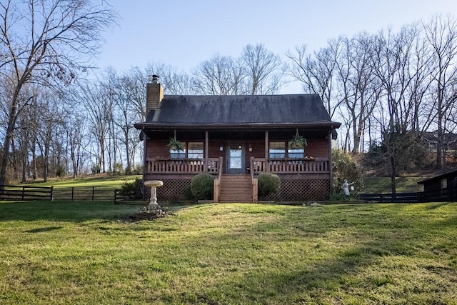 view of front of house with a front lawn and a porch