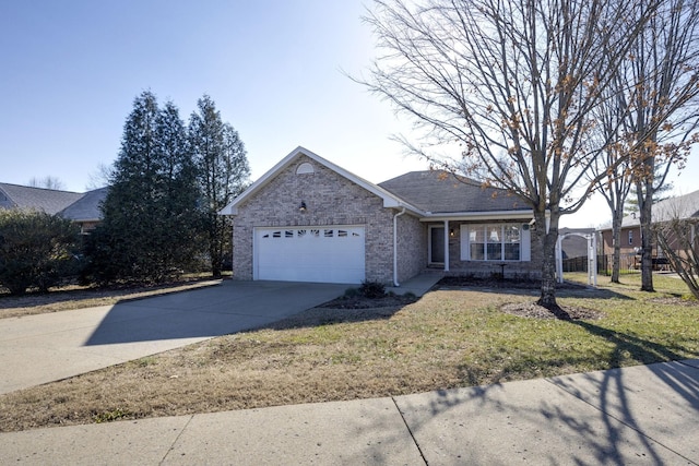 single story home with a garage and a front lawn