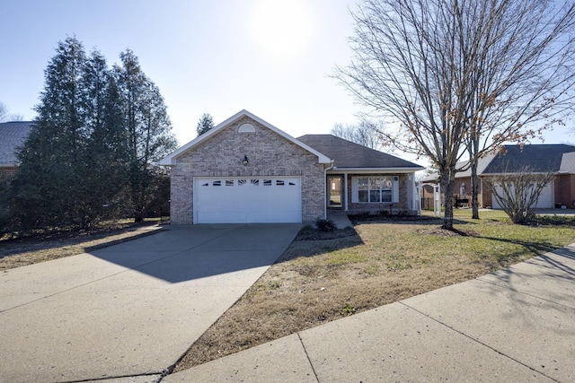 ranch-style house featuring a garage and a front yard