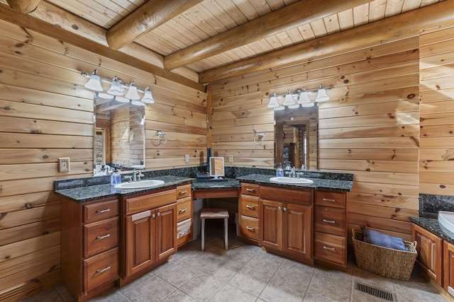 bathroom with wooden ceiling, beamed ceiling, and wood walls