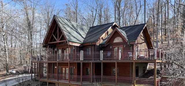 exterior space featuring a wooden deck