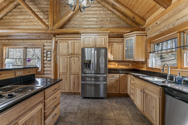 kitchen featuring sink, high vaulted ceiling, light brown cabinets, stainless steel appliances, and log walls