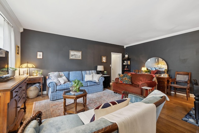 living room with crown molding and wood-type flooring