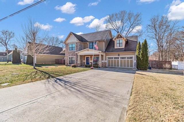 view of front property with a porch, a garage, and a front yard