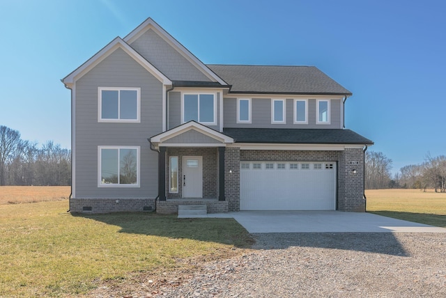 view of front facade featuring a garage and a front yard