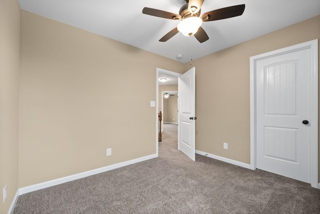 unfurnished bedroom featuring carpet flooring and ceiling fan