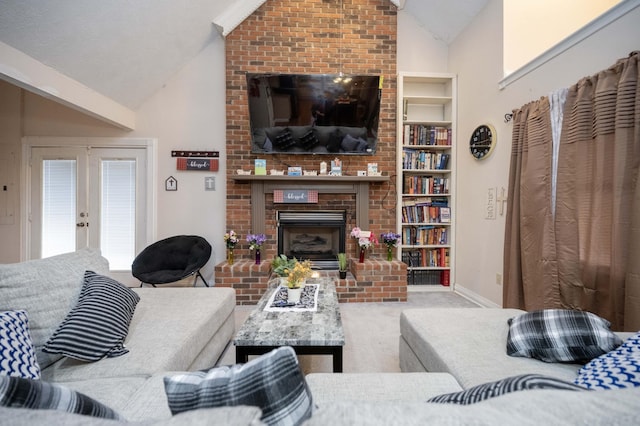 carpeted living room featuring lofted ceiling, a brick fireplace, and french doors