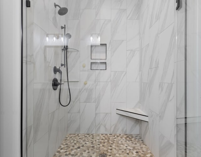 bathroom featuring tiled shower