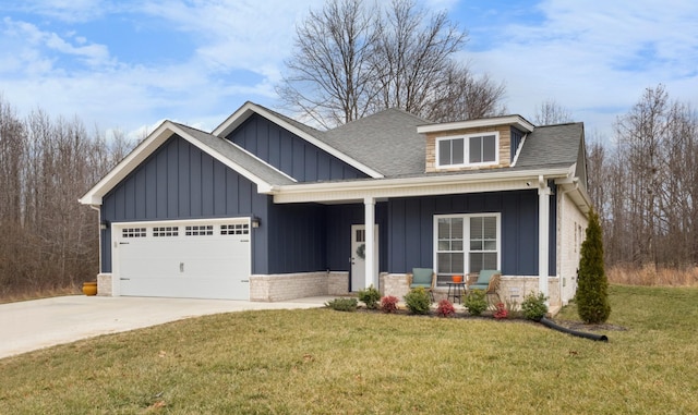 craftsman-style house with a garage, a front yard, and a porch