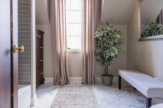 interior space featuring vaulted ceiling