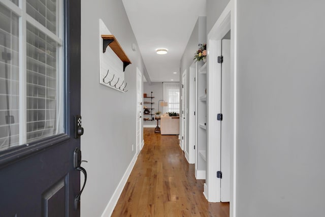 hall featuring hardwood / wood-style flooring