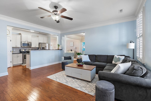 living room featuring ornamental molding, dark hardwood / wood-style floors, and ceiling fan