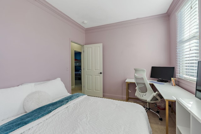 bedroom featuring multiple windows and crown molding