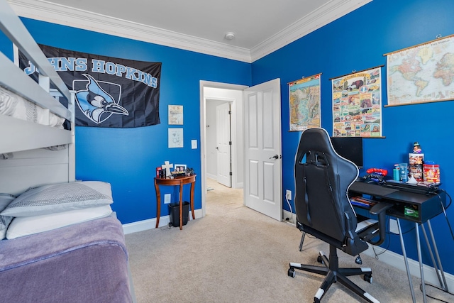 carpeted home office featuring ornamental molding