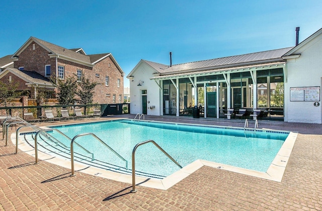 view of pool with a patio