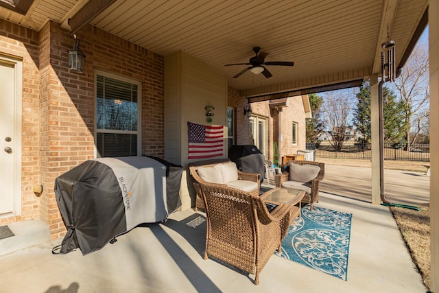 view of patio / terrace with area for grilling, outdoor lounge area, and ceiling fan