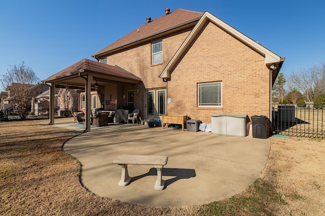 back of house featuring a patio and ceiling fan