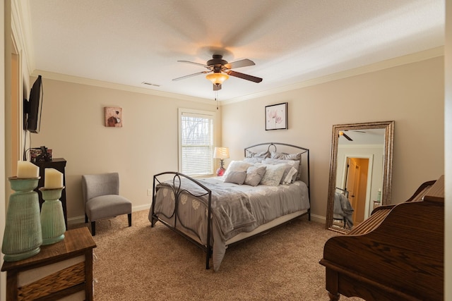 bedroom featuring crown molding, light carpet, and ceiling fan