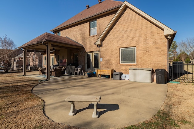 rear view of property with a patio