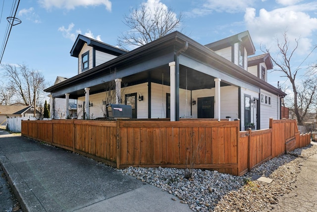 view of home's exterior featuring a porch