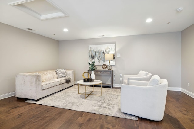 living room featuring dark wood-type flooring