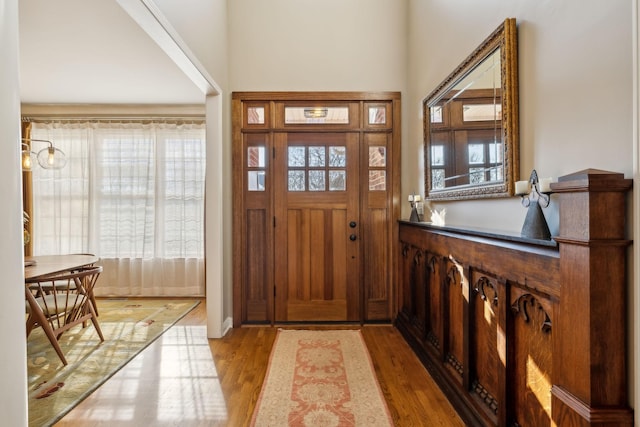 entryway with light hardwood / wood-style floors