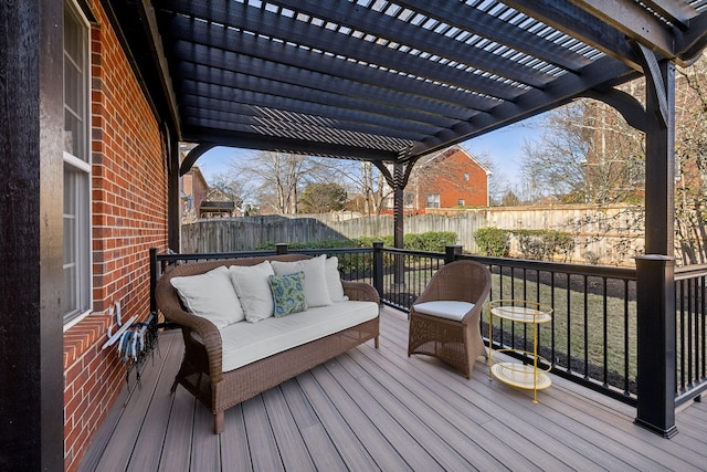 wooden terrace featuring outdoor lounge area and a pergola