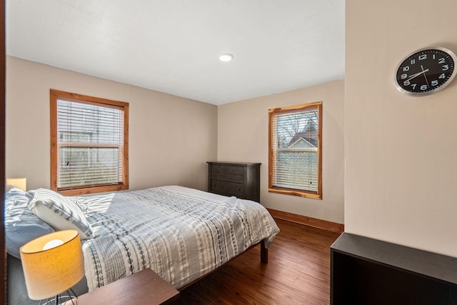 bedroom featuring dark wood-type flooring