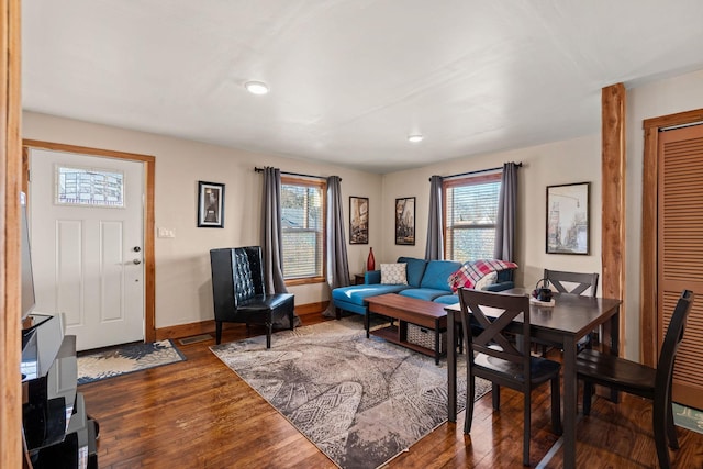 living room with dark wood-type flooring