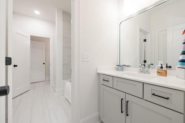 bathroom with vanity, tub / shower combination, and tile patterned floors