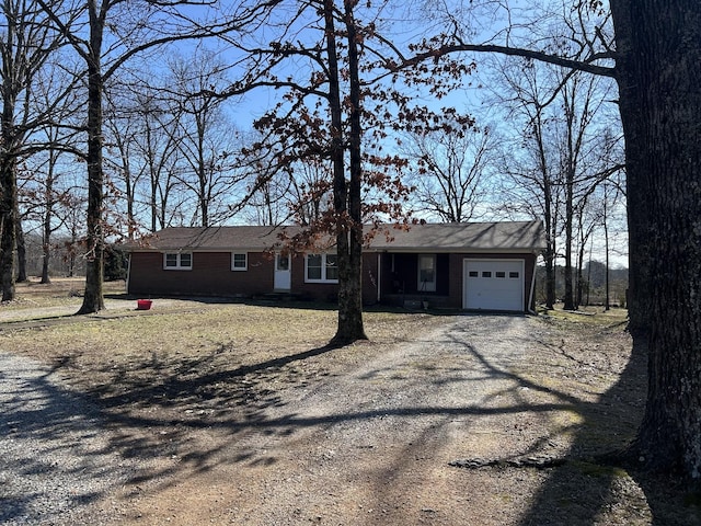 single story home featuring a garage