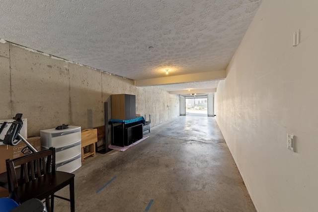 unfurnished living room with concrete flooring