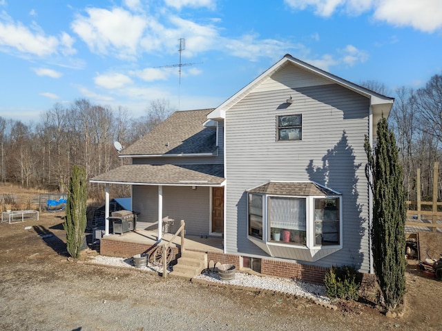 view of front of house featuring covered porch