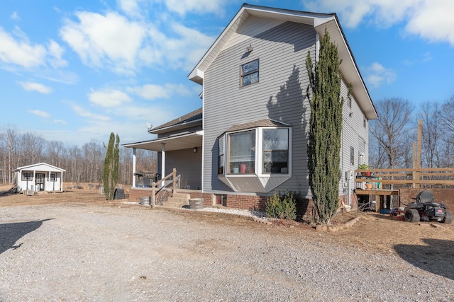 view of front of home featuring covered porch